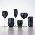 Swirled lines and spots glassware drinking set with black color